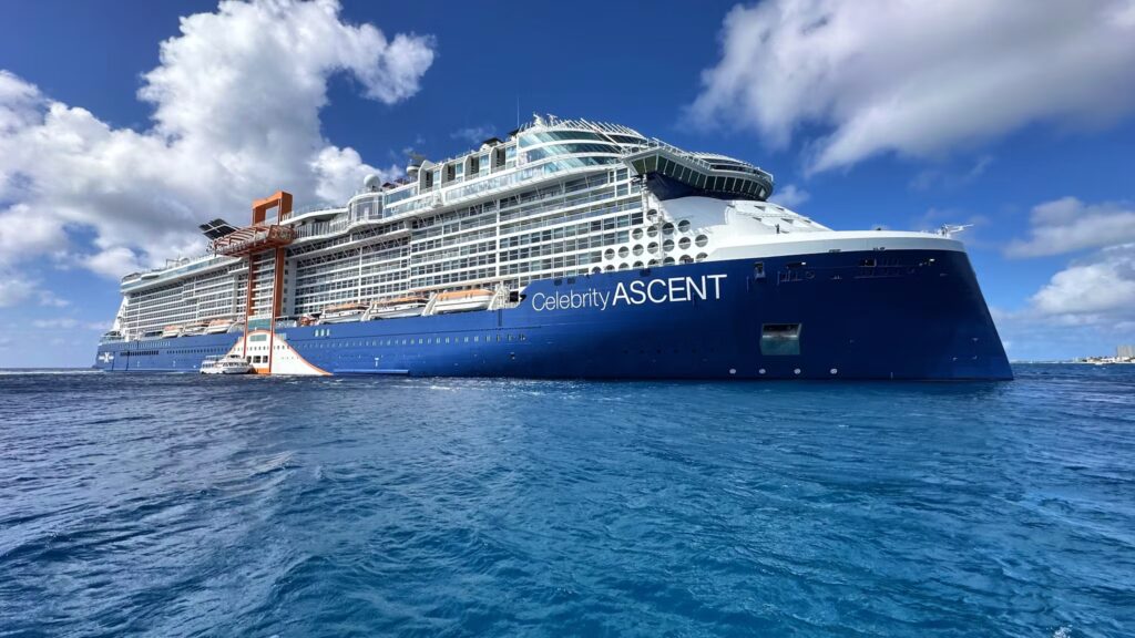 Celebrity's heavy cruise ship Ascent sitting off the coast of Fort Lauderdale, Florida, representing the higher echelon top-of-the-line luxury all-inclusive cruise ship offerings.
